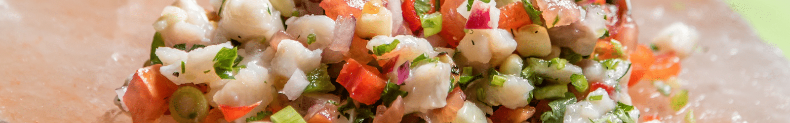 Pink Salt-Block Ceviche Tossed with Cilantro Tomatoes Seasonings